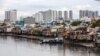 (FILES) Rumah-rumah di tepi kanal Te di Kota Ho Chi Minh, 17 September 2018. (Kao NGUYEN / AFP)
