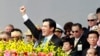 FILE - Taiwan's President Ma Ying-jeou raises his fist after giving a speech during National Day celebrations in front of the presidential office in Taipei.