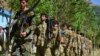 FILE - Militiamen loyal to Ahmad Massoud, son of the late Ahmad Shah Massoud, take part in a training exercise in Panjshir province, northeastern Afghanistan, on Aug. 29, 2021. 