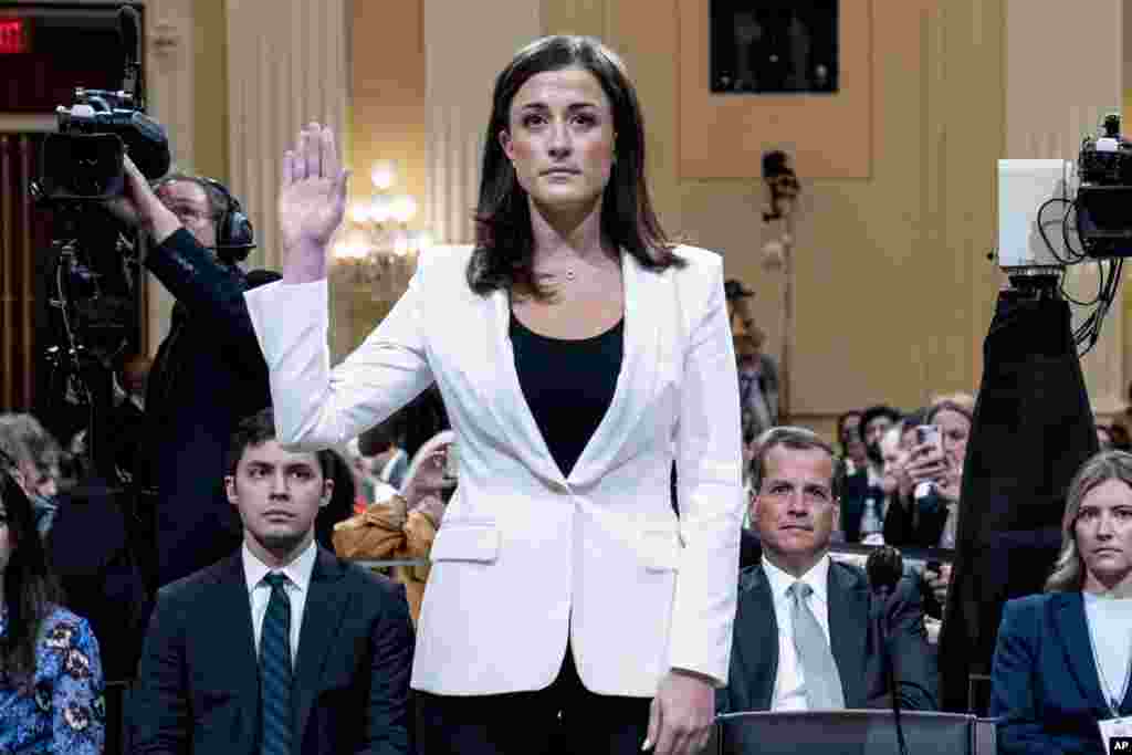 Cassidy Hutchinson, former aide to Trump White House chief of staff Mark Meadows, is sworn in to testify as the House select committee investigating the Jan. 6 attack on the U.S. Capitol holds a hearing at the Capitol in Washington.