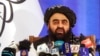 FILE - Taliban Foreign Minister Amir Khan Muttaqi speaks during a news conference in Kabul, Afghanistan, Sept. 14, 2021.