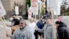 Striking Boeing workers and their supporters picket outside the company's manufacturing facility in Renton, Washington, on Sept. 16, 2024. Boeing announced on Sept. 18 temporary furloughs of professional and white-collar staff for the duration of the strike.