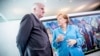 Nemačka kancelarka Angela Merkel i ministar unutrašnjih poslova Horst Zehofer, 13. jun 2018.
