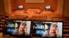 United Nations High Commissioner for Human Rights Michelle Bachelet is seen on a screen as she speaks via video-link during a session of the U.N. Human Rights Council, in Geneva, Feb. 25, 2021.