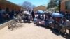 Voters queue outside a polling station in Thamaga, Botswana, west of Gaborone, on Oct. 30, 2024.