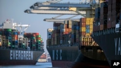 FILE - Container ships are seen at the Port of Savannah, Georgia, Sept. 29, 2021.