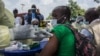 FILE - A health worker from the Guinean Ministry of Health administers an anti-Ebola vaccine in Gueckedou, Guinea, Feb. 23, 2021. 