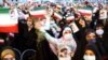 Supporters of Iranian president-elect Ebrahim Raisi celebrate after he won the presidential election in Tehran, Iran, June 19, 2021.