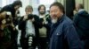 FILE - Chinese artist and dissident Ai Weiwei arrives for a news conference in Berlin, Oct. 26, 2015. 