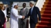 U.S. Secretary of State John Kerry is greeted by Shehab Al-Fahim from the Ministry of Foreign Affairs upon his arrival in Abu Dhabi, United Arab Emirates, Nov. 15, 2016.