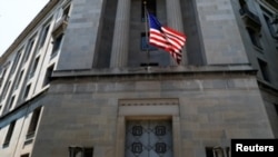 FILE - The U.S. Department of Justice headquarters building is seen in Washington.