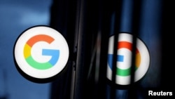 FILE PHOTO: The logo for Google LLC is seen at the Google Store Chelsea in Manhattan, New York City