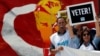 Members of the Journalists Union of Turkey (TGS) carry placards reading 'Enough!' during a demonstration to mark World Press Freedom Day in central Istanbul, Turkey, May 3, 2017.