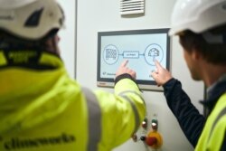 This September 2021 image provided by Climeworks AG shows a chart at a plant called Orca near Reykjavik, Iceland. The plant is the largest such facility in the world, capturing about 4,000 metric tons of carbon dioxide per year. But compared to what the p