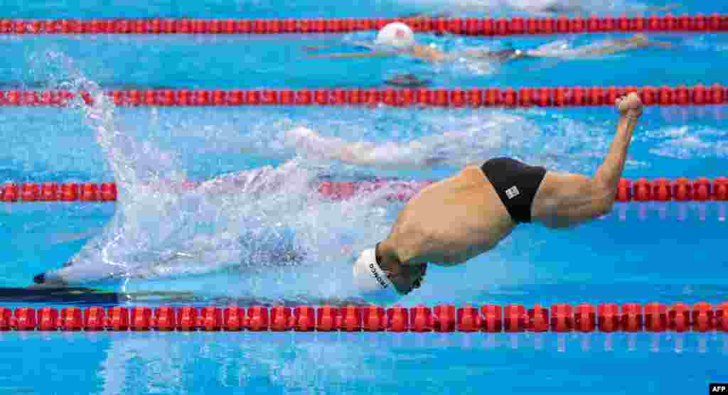 Cristopher Tronco of Mexico enters the water at the start of the men's 50m breaststroke - SB2 final at the Olympic Aquatics Stadium during the Paralympic Games in Rio de Janeiro, Brazil, Sept. 14, 2016.