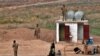 SDF Hands Over 100 IS Prisoners to Iraq