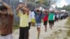 FILE - An undated image released Nov. 13, 2017, shows detainees staging a protest inside the compound at the Manus Island detention center in Papua New Guinea.
