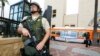 A Los Angeles Sheriffs Counter Terrorism Unit deputy patrols Union Station before the start of Los Angeles Dodgers game in Los Angeles, April 15, 2013.