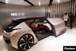 NIO Eve concept car is displayed during a media preview of the Auto China 2018 motor show in Beijing, China