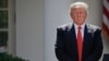 FILE - President Donald Trump stands next to the podium after speaking about the U.S. role in the Paris climate change accord in the Rose Garden of the White House in Washington, June 1, 2017. 