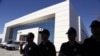 Police officers are seen outside the premises of Koza Ipek Holding, a media group close to U.S.-based moderate Islamic cleric Fethullah Gulen, in Ankara, Turkey, Sept. 1, 2015.
