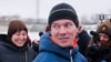 FILE - Russian opposition activist Ildar Dadin (center) speaks to journalists as his wife Anastasia Zotova (left) smiles upon leaving a prison in Rubtsovsk, Russia, Feb. 26, 2017. 