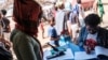 An Eritrean refugee woman is registered at Mai Aini Refugee camp, in Ethiopia, Jan. 30, 2021. 