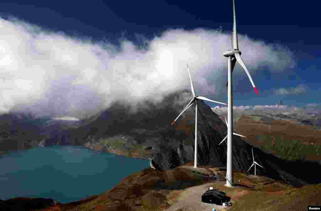 Wind turbines are pictured at Swisswinds farm, Europe's highest wind farm at 2,500m, before the topping out ceremony near the Nufenen Path in Gries, Switzerland.