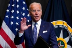 President Joe Biden finishes speaking during a visit to the Office of the Director of National Intelligence in McLean, Va., July 27, 2021.