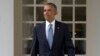 President Barack Obama walks along the colonnade of the White House in Washington, to the residence from the Oval Office, hours before giving his State Of The Union address, Jan. 12, 2016.