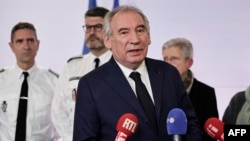 French Prime Minister Francois Bayrou reacts as he speaks to the press, at the Interior Ministry Crisis Centre in Paris, Dec. 14, 2024. 