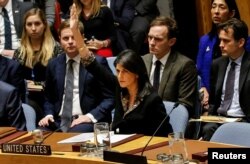 U.S. Ambassador to the United Nations Nikki Haley vetos an Egyptian-drafted resolution regarding recent decisions concerning the status of Jerusalem, during the United Nations Security Council meeting on the situation in the Middle East.