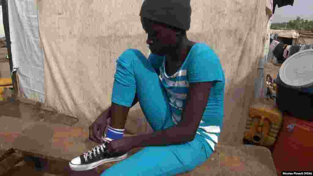 Lami John Ta Tsere Daga Gwoza A Jahar Borno Bayan &#39;Yan Kungiyar Boko Haram Sun Kaima Kauyen Su Hari, An Yi Garkuwa Da Ita Har Na Kwanaki Goma Sha Biyar Byan Yayin Da Suka Harbe Ta A Kafa. &nbsp;