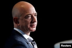 FILE - Jeff Bezos, CEO of Amazon, speaks at a conference in Washington, March 7, 2017.