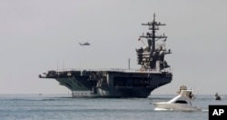 FILE - The USS Carl Vinson