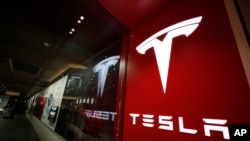 Tesla Executive Departure