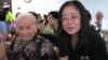 Ching Fen Wang, 95, and her daughter at a Senior Center talent show in Los Angeles.