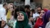 Protesters attend an anti-government rally in downtown Beirut, Lebanon, Sept. 2, 2015.
