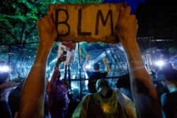 Demonstrators protest June 4, 2020, near the White House in Washington, over the death of George Floyd, a black man who was in police custody in Minneapolis.