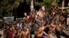 African migrants after crossing the border from Morocco to Spain's North African enclave of Ceuta, August 7, 2017. (Jesus Moron/Reuters)