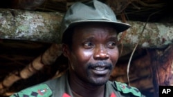 FILE - Joseph Kony, leader of the Lord's Resistance Army during a meeting with a delegation of 160 officials and lawmakers from northern Uganda and representatives of non-governmental organizations, July 31, 2006, Congo near the Sudan border.