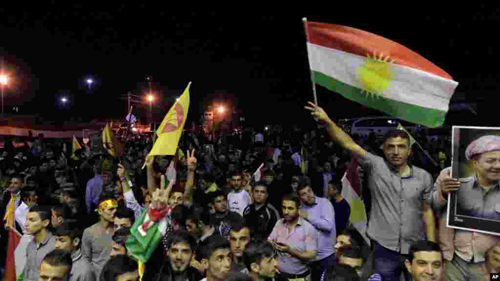 Sojojin Kurdawa Peshmerga a Garin Kobani a Iraqi 29 Oktoba 2014.
