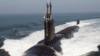 资料照片：未来将作为美国海军“南达科他”号(USS South Dakota)服役的弗吉尼亚级攻击核潜艇在大西洋海上试验期间浮出水面。(美国海军照片)