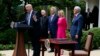 Presiden Donald Trump menyampaikan pidatonya di Rose Garden (Taman Mawar) Gedung Putih, Washington, sebelum penandatanganan inpres yang bertujuan untuk mengurangi peraturan IRS yang membatasi aktivitas politik untuk gereja-gereja, 4 Mei 2017. Didampingi oleh (dua dari kiri ke kanan:) Kardinal Donald Wuerl, Uskup Agung Washington, Pastor Jack Graham, Paula White, pastur senior New Destiny Christian Center di Apopka, Florida dan Wapres Mike Pence. (AP Photo/Evan Vucci)