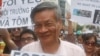 FILE - Nguyen Quang A joins a gather to protest against Taiwanese enterprise Formosa Plastic, says they are demanding cleaner waters in the central regions after mass fish deaths in recent weeks, in Hanoi, Vietnam.