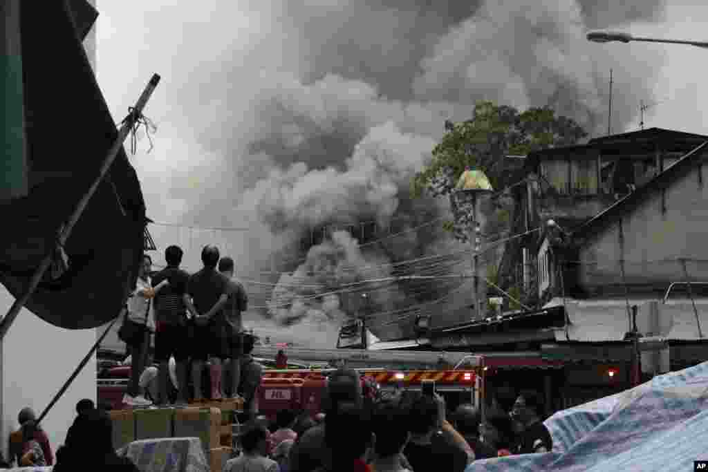 Smoke rises from the fire at the Yau Ma Tei fruit market, a tourist spot in Hong Kong.&nbsp;The market was founded in 1913 and is classified as a grade three historic building.&nbsp;