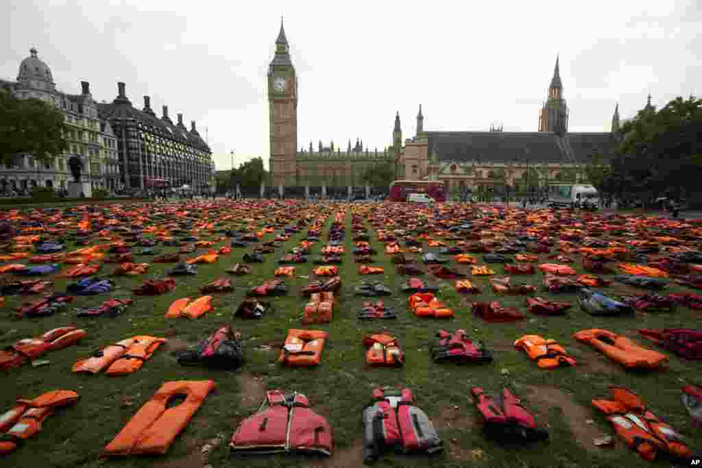 Some 2,500 lifejackets worn by refugees,&nbsp; who made the sea crossing from Turkey to the Greek, island of Chios are displayed in what the organizers called a &quot;Lifejacket Graveyard&quot; in Parliament Square, London, backdropped by the Houses of Parliament.