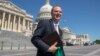 FILE - Rep. Adam Schiff, D-Calif., Chairman of the House Intelligence Committee, walks across the plaza on Capitol Hill in Washington.