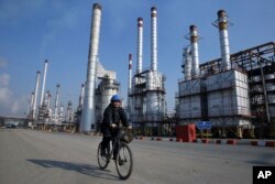 FILE - An oil refinery in Tehran, Iran.