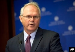 FILE - Then-U.S. Ambassador to Iraq Christopher Hill speaks at the United States Institute of Peace in Washington.